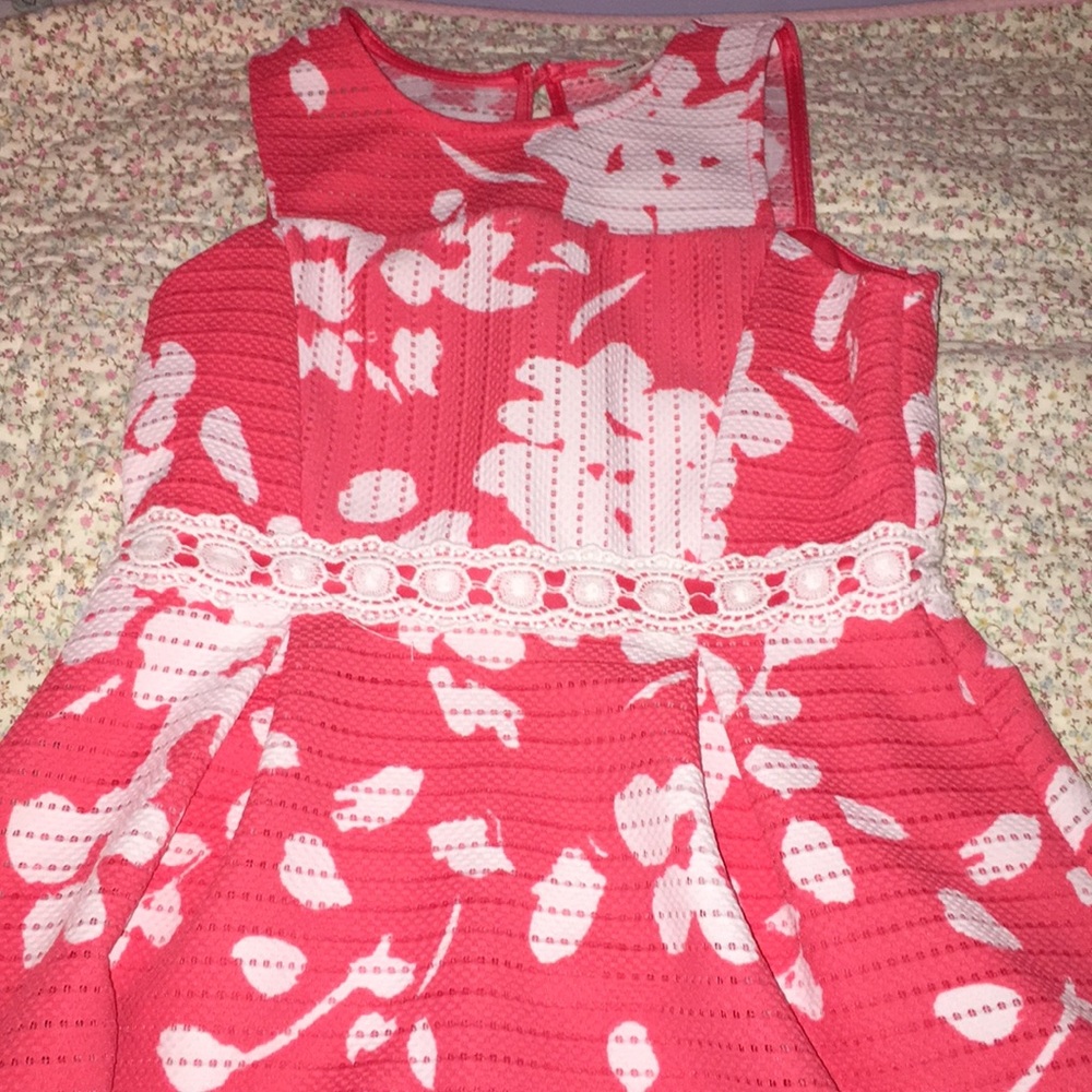 A coral colored dress
